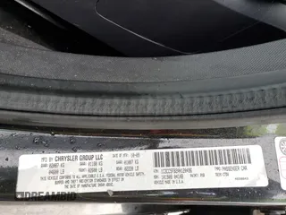 2010 Chrysler Sebring Limited with VIN 1C3CC5FB2AN120496, listed as a Copart auction lot 82131024 with 106,563 mi miles and Salvage Title. Bid and sale history available at carsss.com. Image 12.