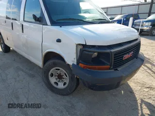 2014 GMC Savana Cargo Van with VIN 1GTW7GCA2E1169201, listed as a IAAI auction lot 41648525 with 462,975 mi miles. Bid and sale history available at carsss.com. Image 6.