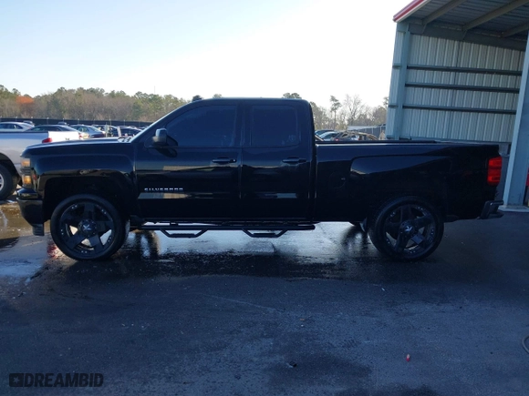 2014 Chevrolet Silverado 1500 LT with VIN 1GCRCREC5EZ400824, listed as a IAAI auction lot 41658622 with 107,105 mi miles. Bid and sale history available at carsss.com. Image 14.