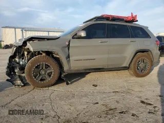 2020 Jeep Grand Cherokee Trailhawk with VIN 1C4RJFLT9LC430514, listed as a Copart auction lot 85311924 with 170,554 mi miles and Salvage title. Bid and sale history available at DreamBid. Image 1.