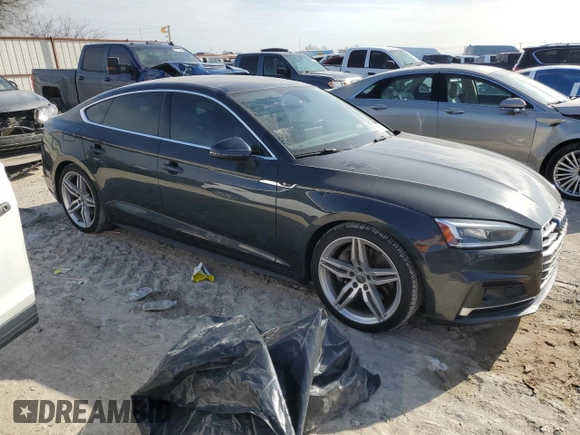 2018 Audi A5 Sportback Prestige z VIN WAUFNCF50JA128442, wystawiony jako Copart lot #86828644 z przebiegiem 101 650 mil mil oraz Szkoda całkowita • Salvage title. Historia ofert i sprzedaży dostępna na DreamBid. Obrazek 4.