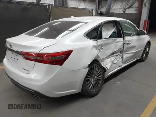 2016 Toyota Avalon Limited with VIN 4T1BK1EB0GU234267, listed as a IAAI auction lot 41567075 with 116,864 mi miles and . Bid and sale history available at carsss.com. Image 4.
