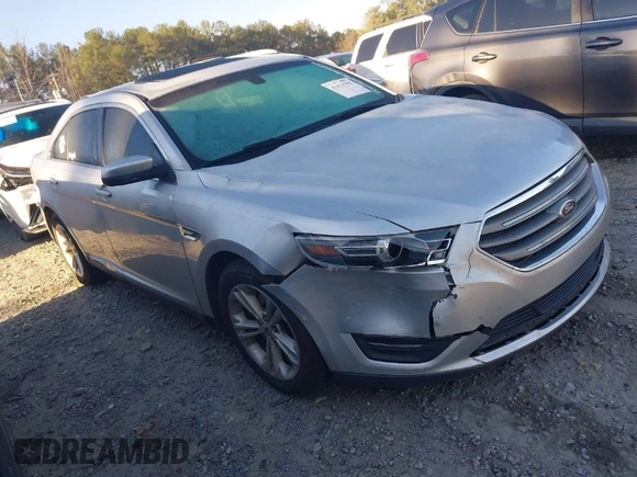 2015 Ford Taurus SEL with VIN 1FAHP2E84FG189640, listed as a IAAI auction lot 41814795 with 100,209 mi miles and . Bid and sale history available at DreamBid. Image 1.
