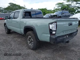 2023 Toyota Tacoma SR5 z VIN 3TYDZ5BNXPT024914, wystawiony jako IAAI lot #41302756 z przebiegiem 20 307 mil mil oraz . Historia ofert i sprzedaży dostępna na DreamBid. Obrazek 3.