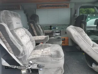 2000 Ford Econoline Cargo Recreational z VIN 1FDRE14L3YHA17676, wystawiony jako Copart lot #58571465 z przebiegiem 174 129 mil mil oraz Szkoda całkowita • Salvage title. Historia ofert i sprzedaży dostępna na DreamBid. Obrazek 11.