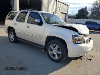 2013 Chevrolet Tahoe LTZ с VIN 1GNSCCE09DR317231, выставлен на аукционе Copart как лот 86056684 с пробегом 116 151 миль миль и Списание • Salvage title. История ставок и продаж доступна на DreamBid. Изображение 4.