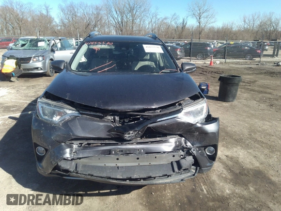 2018 Toyota RAV4 XLE with VIN JTMRFREV9JJ742276, listed as a IAAI auction lot 41855530 with 115,815 mi miles. Bid and sale history available at carsss.com. Image 12.