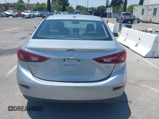 2018 Mazda 3 Touring z VIN 3MZBN1V35JM272638, wystawiony jako IAAI lot #42458722 z przebiegiem 98 393 mil mil oraz . Historia ofert i sprzedaży dostępna na DreamBid. Obrazek 16.