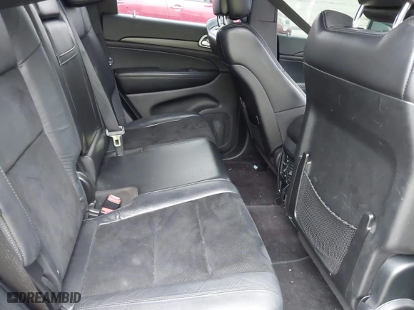 2018 Jeep Grand Cherokee Laredo E with VIN 1C4RJFAG7JC312948, listed as a IAAI auction lot 41624027 with 116,763 mi miles. Bid and sale history available at carsss.com. Image 8.