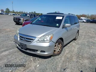 2007 Honda Odyssey EX-L with VIN 5FNRL387X7B080906, listed as a IAAI auction lot 41910061 with 229,717 mi miles and . Bid and sale history available at DreamBid. Image 17.