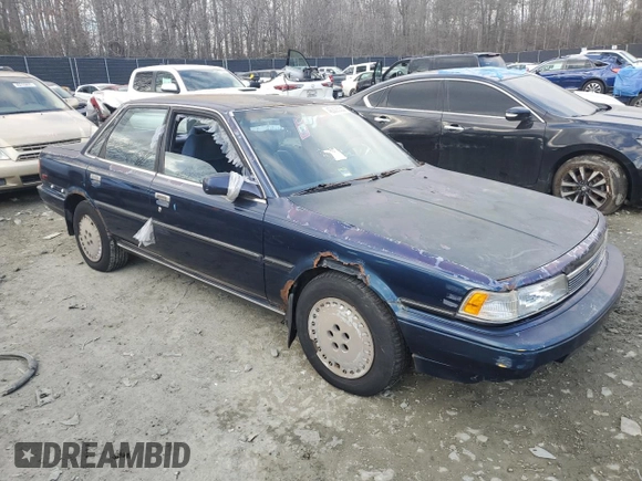 1989 Toyota Camry z VIN 4T1SV22E0KU032677, wystawiony jako Copart lot #46308555 z przebiegiem 993 896 mil mil oraz Czysty tytuł • Clean title. Historia ofert i sprzedaży dostępna na DreamBid. Obrazek 4.