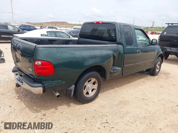 2001 Ford F-150 XL with VIN 1FTZX07271KB88709, listed as a IAAI auction lot 42599181 with 153,985 mi miles and . Bid and sale history available at DreamBid. Image 4.