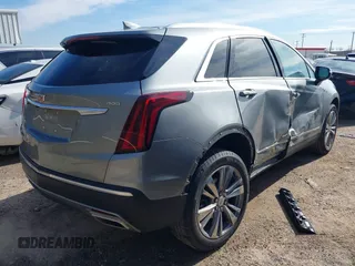 2025 Cadillac XT5 FWD Premium Luxury with VIN 1GYKNCRS1SZ120351, listed as a IAAI auction lot 41334881 with 4,915 mi miles. Bid and sale history available at carsss.com. Image 4.