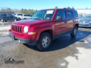2014 Jeep Patriot Sport with VIN 1C4NJRBB6ED809492, listed as a IAAI auction lot 41644559 with 199,782 mi miles. Bid and sale history available at carsss.com. Image 2.