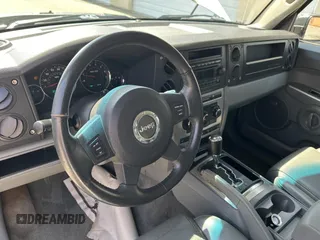 2007 Jeep Commander Sport z VIN 1J8HG48KX7C530019, wystawiony jako Copart lot #52238705 z przebiegiem 167 240 mil mil oraz Czysty tytuł • Clean title. Historia ofert i sprzedaży dostępna na DreamBid. Obrazek 9.