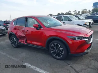 2023 Mazda CX-5 S Premium with VIN JM3KFBDM2P0130525, listed as a IAAI auction lot 41479518 with 18,145 mi miles and . Bid and sale history available at DreamBid. Image 13.