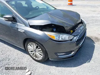 2018 Ford Focus Titanium с VIN 1FADP3J22JL314642, выставлен на аукционе IAAI как лот 42128194 с пробегом 62 787 миль миль и . История ставок и продаж доступна на DreamBid. Изображение 18.