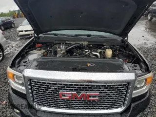 2015 GMC Sierra 2500HD Denali z VIN 1GT120E82FF100619, wystawiony jako Copart lot #58014705 z przebiegiem 188 525 mil mil oraz Szkoda całkowita • Salvage title. Historia ofert i sprzedaży dostępna na DreamBid. Obrazek 11.