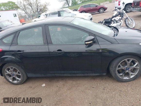 2014 Ford Focus SE z VIN 1FADP3K20EL386198, wystawiony jako IAAI lot #42157909 z przebiegiem 125 097 mil mil oraz . Historia ofert i sprzedaży dostępna na DreamBid. Obrazek 13.