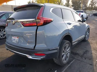 2021 Honda CR-V Touring with VIN 7FART6H97ME010816, listed as a IAAI auction lot 42256962 with 86,223 mi miles and . Bid and sale history available at DreamBid. Image 4.