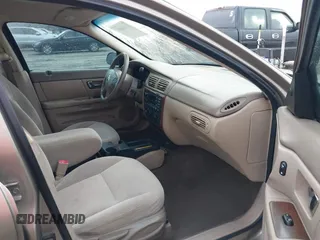 2003 Mercury Sable GS z VIN 1MEFM50U33A606937, wystawiony jako IAAI lot #41058899 z przebiegiem 138 479 mil mil oraz . Historia ofert i sprzedaży dostępna na DreamBid. Obrazek 5.