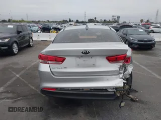 2018 Kia Optima S with VIN 5XXGT4L35JG216039, listed as a IAAI auction lot 42451216 with 91,679 mi miles and . Bid and sale history available at DreamBid. Image 16.