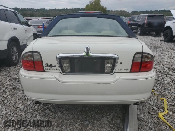 2005 Lincoln LS Sport z VIN 1LNHM87A05Y667868, wystawiony jako Copart lot #73318074 z przebiegiem 114 623 mil mil oraz Szkoda całkowita • Salvage title. Historia ofert i sprzedaży dostępna na DreamBid. Obrazek 6.