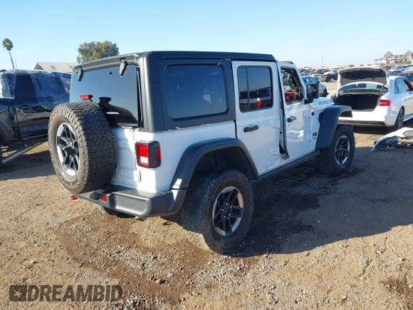 2019 Jeep Wrangler Unlimited Rubicon with VIN 1C4HJXFN7KW505383, listed as a IAAI auction lot 41220907 with 53,578 mi miles and . Bid and sale history available at DreamBid. Image 4.