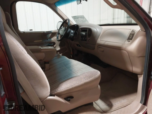 1998 Ford F-150 with VIN 1FTZX18W8WKA19037, listed as a IAAI auction lot 40977819 with 137,119 mi miles and . Bid and sale history available at DreamBid. Image 5.