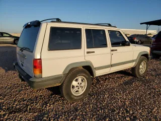 1997 Jeep Cherokee Sport z VIN 1J4FJ68S9VL594832, wystawiony jako Copart lot #53081675 z przebiegiem 167 028 mil mil oraz Czysty tytuł • Clean title. Historia ofert i sprzedaży dostępna na DreamBid. Obrazek 3.