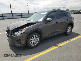 2016 Mazda CX-5 Touring с VIN JM3KE4CY2G0789627, выставлен на аукционе Copart как лот 61254835 с пробегом 90 560 миль миль и Списание • Salvage title. История ставок и продаж доступна на DreamBid. Изображение 1.