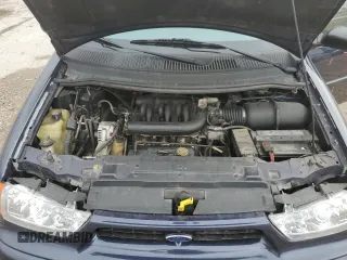 1998 Ford Windstar LX with VIN 2FMZA5146WBC36500, listed as a Copart auction lot 57662025 with 143,017 mi miles and Salvage title. Bid and sale history available at DreamBid. Image 12.