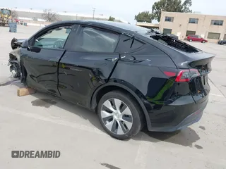2023 Tesla Model Y Long Range with VIN 7SAYGDEE1PF748426, listed as a IAAI auction lot 41839308 with 26,633 mi miles and . Bid and sale history available at carsss.com. Image 3.