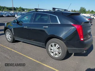 2016 Cadillac SRX Luxury Collection with VIN 3GYFNEE39GS532145, listed as a IAAI auction lot 42670496 with 193,959 mi miles and . Bid and sale history available at DreamBid. Image 3.