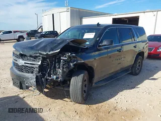 2019 Chevrolet Tahoe Commercial z VIN 1GNLCDEC4KR295348, wystawiony jako IAAI lot #41225134 z przebiegiem Nie podano mil oraz . Historia ofert i sprzedaży dostępna na DreamBid. Obrazek 17.