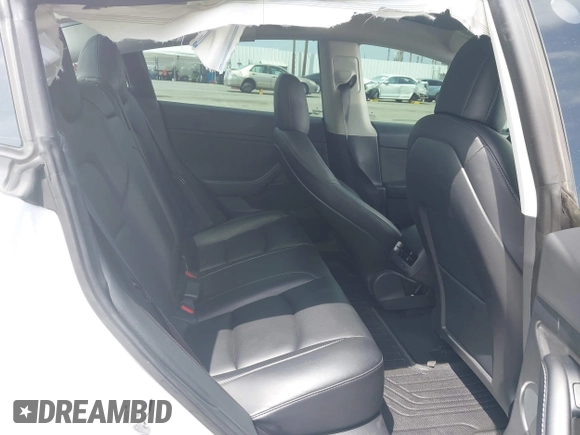 2021 Tesla Model 3 Performance with VIN 5YJ3E1EC2MF084594, listed as a IAAI auction lot 42030339 with 43,215 mi miles and . Bid and sale history available at DreamBid. Image 8.