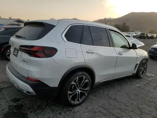 2024 BMW X5 xDrive50e with VIN 5UX43EU07R9S99719, listed as a Copart auction lot 86121144 with 0 mi miles and Salvage Title. Bid and sale history available at carsss.com. Image 3.