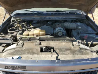 2000 Ford F-350 XL with VIN 1FTSW31F7YEE20820, listed as a Copart auction lot 77496284 with 312,193 mi miles and Salvage Title. Bid and sale history available at DreamBid. Image 11.