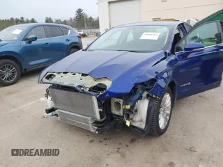 2016 Ford Fusion SE Hybrid with VIN 3FA6P0LU8GR264619, listed as a IAAI auction lot 40968963 with 45,136 mi miles. Bid and sale history available at carsss.com. Image 6.