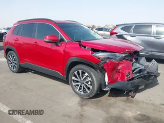 2023 Toyota Corolla Cross XLE with VIN 7MUDAAAG0PV065993, listed as a IAAI auction lot 42629443 with 16,056 mi miles and . Bid and sale history available at DreamBid. Image 1.