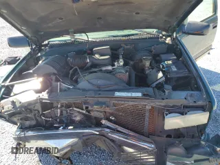 1997 GMC Suburban z VIN 1GKFK16R0VJ749323, wystawiony jako Copart lot #50222125 z przebiegiem 209 355 mil mil oraz Szkody całkowita. Historia ofert i sprzedaży dostępna na DreamBid. Obrazek 13.