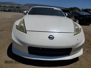 2011 Nissan 370Z Touring z VIN JN1AZ4EH7BM551606, wystawiony jako Copart lot #57173945 z przebiegiem Nie podano mil oraz Szkoda całkowita • Salvage title. Historia ofert i sprzedaży dostępna na DreamBid. Obrazek 5.