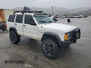 1989 Jeep Cherokee z VIN 1J4FT28LXKL601505, wystawiony jako Copart lot #49312265 z przebiegiem 264 769 mil mil oraz Szkoda całkowita • Salvage title. Historia ofert i sprzedaży dostępna na DreamBid. Obrazek 4.