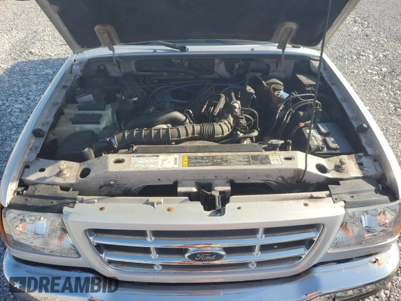 2002 Ford Ranger XL with VIN 1FTYR14U72TA19237, listed as a Copart auction lot 62276095 with 74,517 mi miles and Salvage title. Bid and sale history available at DreamBid. Image 11.