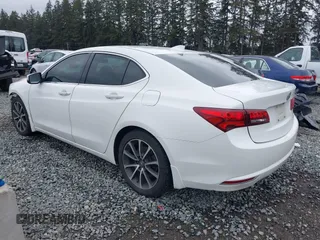 2015 Acura TLX V6 Tech with VIN 19UUB3F57FA009086, listed as a IAAI auction lot 41735411 with 212,203 mi miles. Bid and sale history available at carsss.com. Image 3.