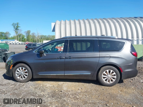 2018 Chrysler Pacifica Touring L with VIN 2C4RC1BG1JR112084, listed as a IAAI auction lot 42206441 with 163,952 mi miles and . Bid and sale history available at DreamBid. Image 14.