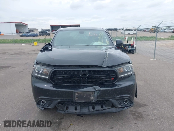 2014 Dodge Durango SXT with VIN 1C4RDJAG1EC552075, listed as a IAAI auction lot 42292301 with 122,427 mi miles and . Bid and sale history available at DreamBid. Image 12.