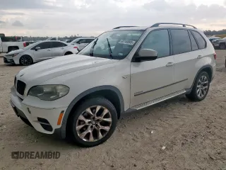 2012 BMW X5 35i z VIN 5UXZV4C55CL765794, wystawiony jako Copart lot #60749995 z przebiegiem 167 793 mil mil oraz Czysty tytuł • Clean title. Historia ofert i sprzedaży dostępna na DreamBid. Obrazek 1.