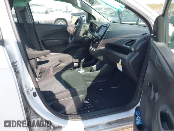 2022 Chevrolet Spark LS with VIN KL8CB6SA3NC036523, listed as a IAAI auction lot 41421387 with 59,801 mi miles and . Bid and sale history available at DreamBid. Image 5.