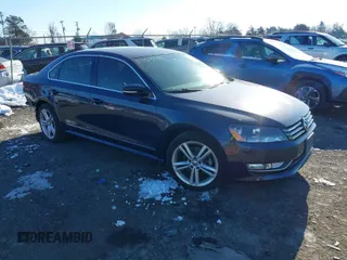 2015 Volkswagen Passat 1.8T SE w/Sunroof & Nav with VIN 1VWBT7A30FC010548, listed as a IAAI auction lot 41363214 with 80,284 mi miles. Bid and sale history available at carsss.com. Image 1.